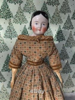 Antique German China head doll 22 inches tall