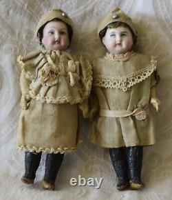 Antique Pair of Small German Bisque Head Dolls in Original Clothing