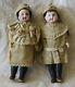 Antique Pair Of Small German Bisque Head Dolls In Original Clothing