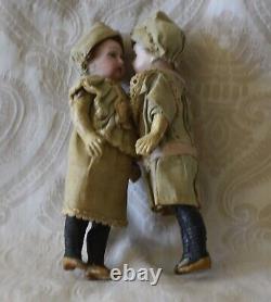 Antique Pair of Small German Bisque Head Dolls in Original Clothing