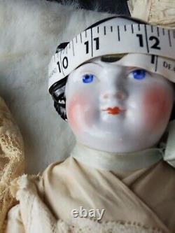 Antique Porcelain 11 high brown white Leather Body Doll 18 VERY CLEAN BODY