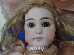 Antique doll French doll Simon & Halbig Jumeau paperweight eyes closed mouth