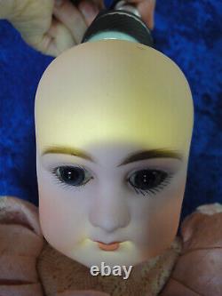 Antique doll French doll Simon & Halbig Jumeau paperweight eyes closed mouth