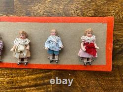 Antique pattern card with 6 dolls