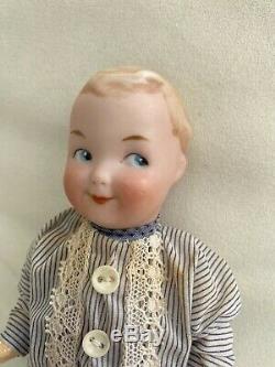 Antique porcelain head doll Gebrüder Heubach Googly Googlie