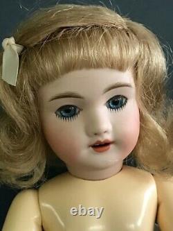 BLEUETTE Reproduction porcelain doll. 11 Mold UNIS301 Blue eyes 27 cm