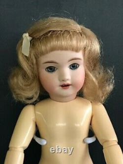 BLEUETTE Reproduction porcelain doll. 11 Mold UNIS301 Blue eyes 27 cm