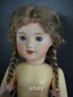 BLEUETTE Reproduction porcelain doll. 11 Mold UNIS301 Blue eyes 27 cm
