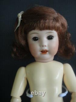 BLEUETTE Reproduction porcelain doll. Mold SFBJ251 Brown eyes FRANCE