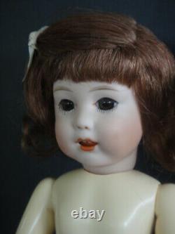 BLEUETTE Reproduction porcelain doll. Mold SFBJ251 Brown eyes FRANCE
