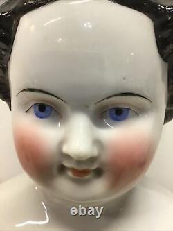 Beautiful Large 25 Antique China Head Doll. Hi brow with black hair /blue eyes