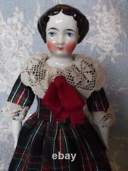 Beautiful china porcelain doll, hairstyle 1860, full dressed