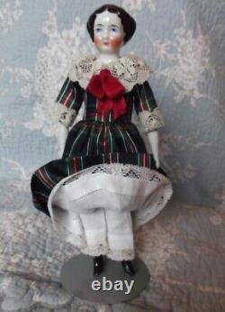 Beautiful china porcelain doll, hairstyle 1860, full dressed