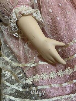 Charming Vintage Porcelain Doll with Blonde Curly Hair and Dress