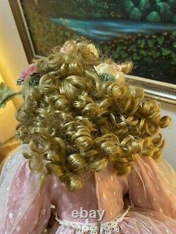 Charming Vintage Porcelain Doll with Blonde Curly Hair and Dress