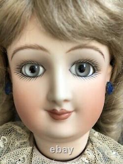 Collectible Porcelain Reproduction of Antique French Fashion Smiling Bru Doll