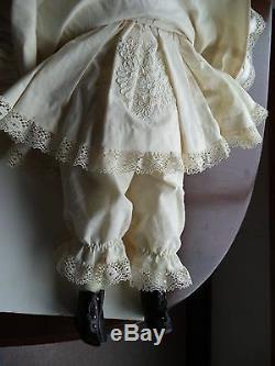 French Bébé Reproduction porcelain doll originally made by Andre Thuillier