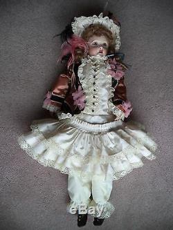 French Bébé Reproduction porcelain doll originally made by Andre Thuillier