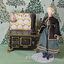 German Parian dollhouse doll with stove