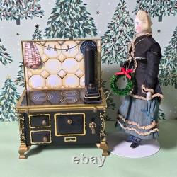 German Parian dollhouse doll with stove
