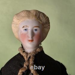 German Parian dollhouse doll with stove