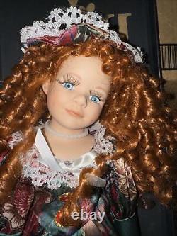 Hand painted vintage porcelain doll collectible