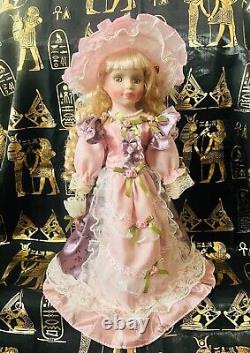 Haunted Vintage Porcelain Doll Attached is an Enochian Angel