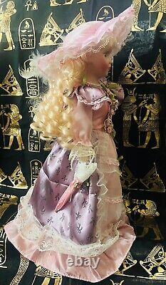 Haunted Vintage Porcelain Doll Attached is an Enochian Angel