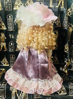 Haunted Vintage Porcelain Doll Attached is an Enochian Angel
