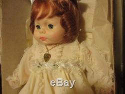 Horsman porcelain Baby Doll Lynette Vintage yellow dress, heart necklace, red ha