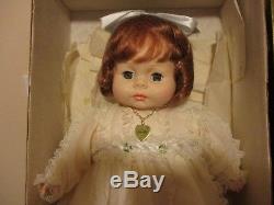 Horsman porcelain Baby Doll Lynette Vintage yellow dress, heart necklace, red ha