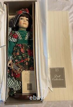 JC Penny Exclusive Porcelain Doll 16 Doll Collection Christmas Edition