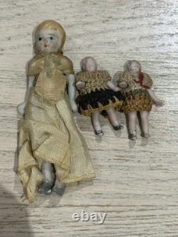 Lot of 4 Antique Porcelain Dolls