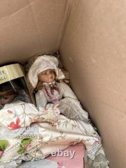 Lot of 9 Vintage Porcelain Collector Dolls New in Boxes Some without boxes