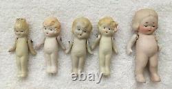 Lot of Antique small baby doll vintage bisque porcelain varied painted