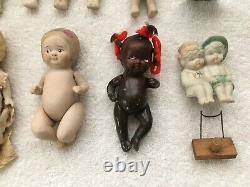 Lot of Antique small baby doll vintage bisque porcelain varied painted