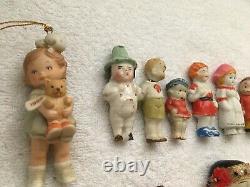 Lot of Antique small baby doll vintage bisque porcelain varied painted