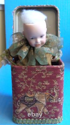 Lot of Vintage Porcelain Dolls and Musical Jack in the Box and Extras