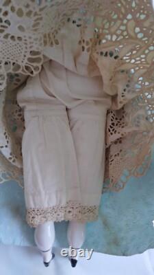 Old 16 Porcelain Dolls with original handmade cloths, 16 porcelain dolls