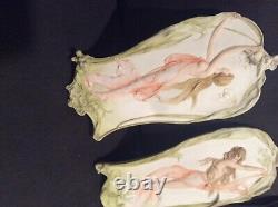 Pair of antique bisque wall plaques. Made in Germany
