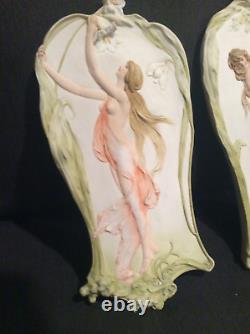 Pair of antique bisque wall plaques. Made in Germany