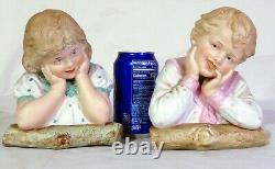 Pr Huebach German Bisque Porcelain Piano Baby Busts Doll Logs Boy Girl Figurines