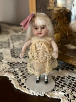 Precious Antique Germany All Bisque Girl