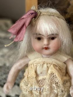 Precious Antique Germany All Bisque Girl