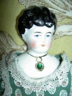 Pretty antique china head doll with imbeded Jeweled necklace by Hertwig, Germany