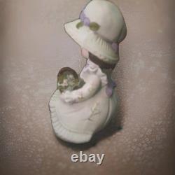 Rare vintage girl porcelain figurine doll with flowers