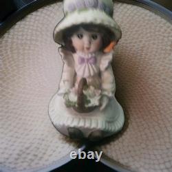 Rare vintage girl porcelain figurine doll with flowers