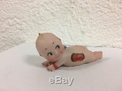 VINTAGE PORCELAIN KEWPIE laying on stomach sticker N° 5517 Rose O'NEILL F 1912