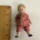 Vintage Or Antique Miniature Porcelain Boy Doll In Striped Clothes Dollhouse