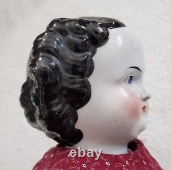 Vintage 22.5 Tall Porcelain Black Hair Cloth Body China Head Doll